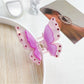 Beau two tier butterfly claw clip in pastel pink with soft shadows