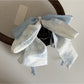 Beau bow ribbon streamer claw clip with multiple ribbon layers in pastel pink shades