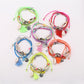 Lovra Bohemian style multi-row bracelet with colorful beads and silver accents on a white background