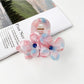 Beau vintage double flower hair claw clip styled with casual outfit