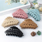Close-up of Beau leaf shaped hair clip showing detailed texture