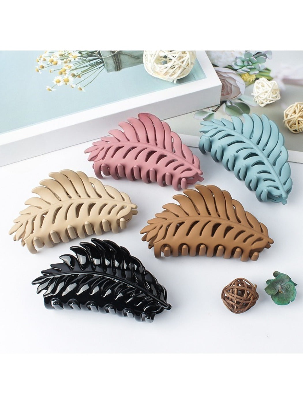 Close-up of Beau leaf shaped hair clip showing detailed texture