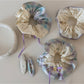 Gifty checkered bow ribbon scrunchie wrapped around wrist