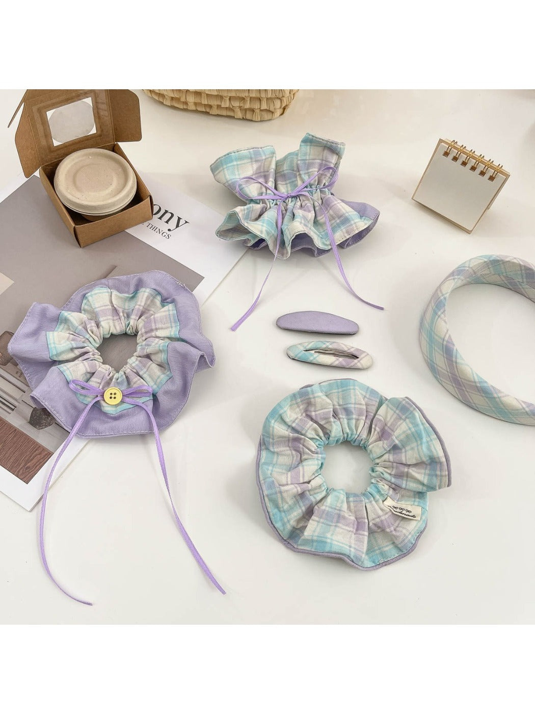 Plaid scrunchie headband and matching hair clip on white background