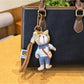 Side view of the bear charm keychain showing detailed bear face and paws