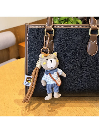 Side view of the bear charm keychain showing detailed bear face and paws