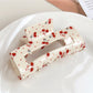 Top view of Beau floral print square hair claw clip showing square shape