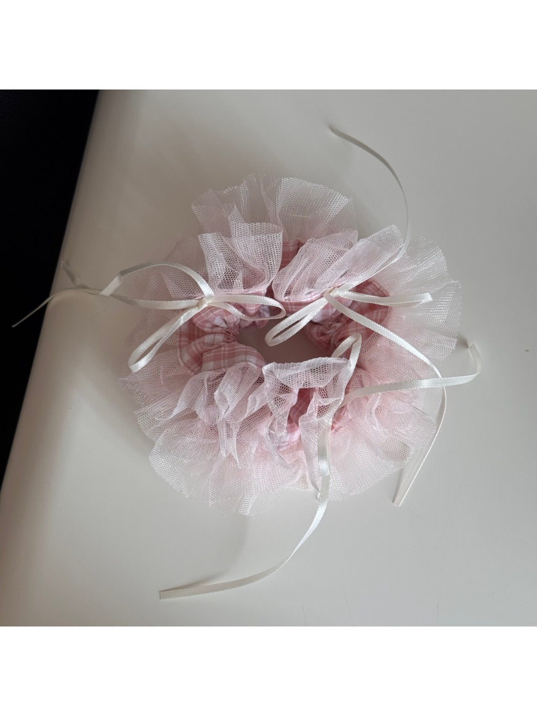 Gifty Ribbon Knot Tulle Scrunchie packaged in a clear plastic box with branding