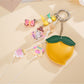 Keypus - Cartoon Peach Faux Leather Bag Charm Keychain
