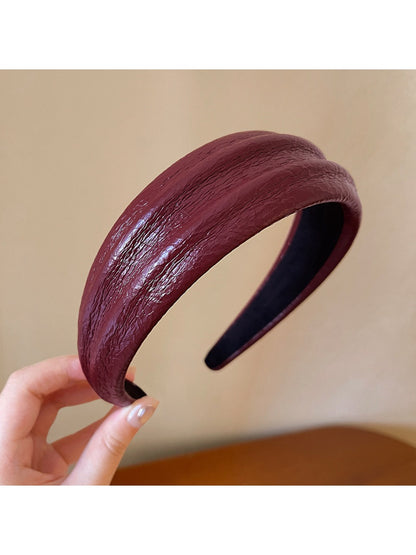 Side view of Gifty wide edge headband highlighting its wide edge design