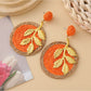 Earedge round leaf pendant earrings shown from front and back angles