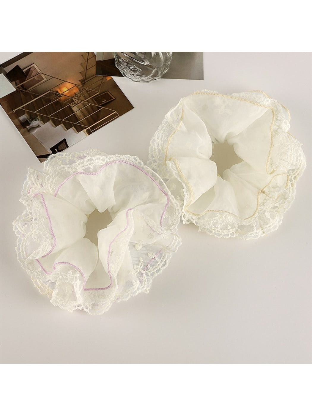 Gifty scrunchie showing layered design with pink and white fabric textures