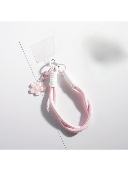 Keypus flower-shaped rope keychain attached to a set of keys