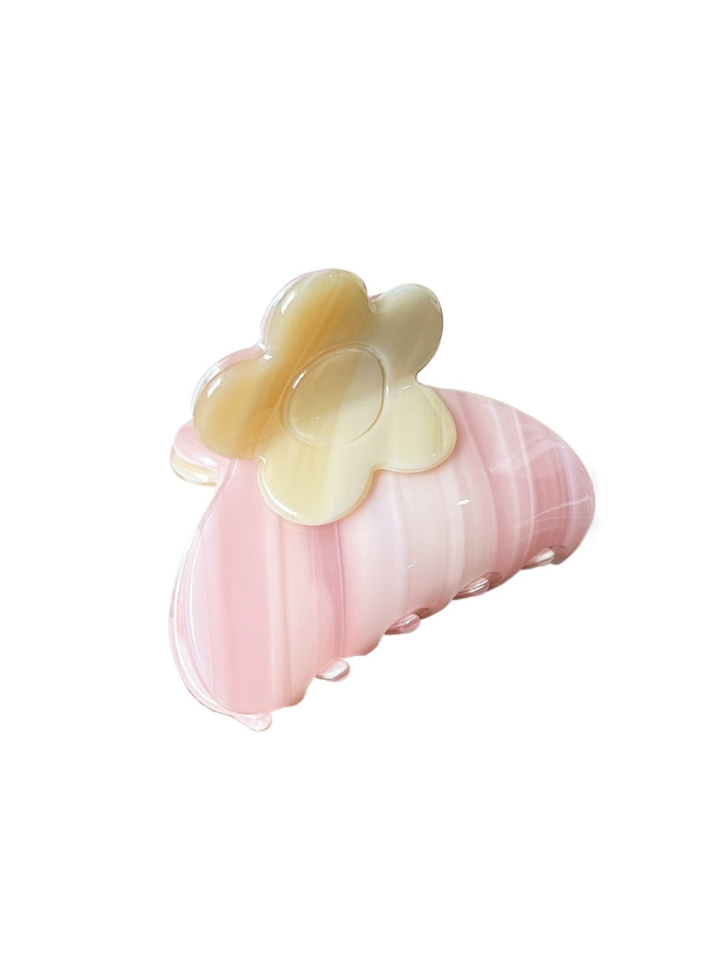 Beau hair clip packaging featuring colorful flower pattern and brand name