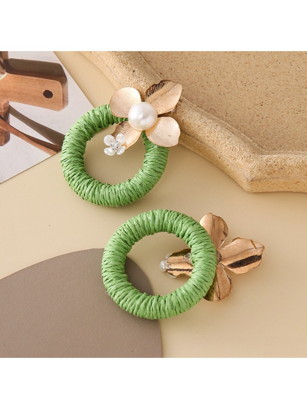 Earedge round floral pendant earrings displayed on a white background