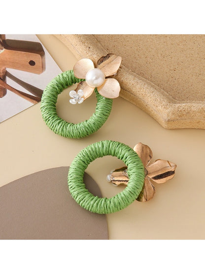 Earedge round floral pendant earrings displayed on a white background