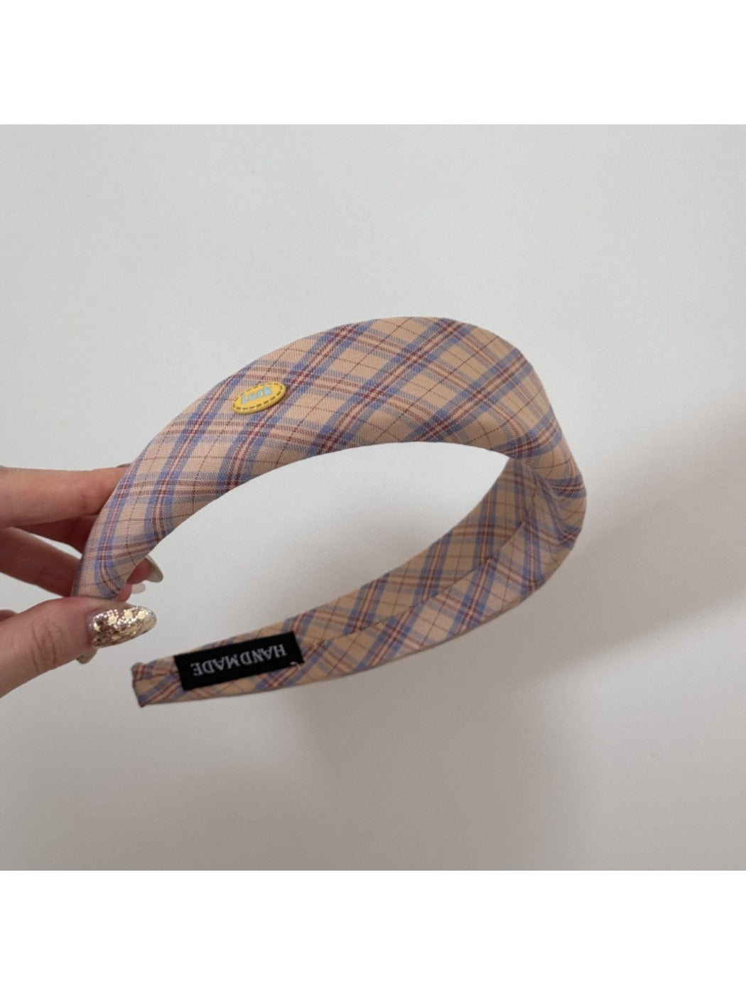 Gifty Sweet Plaid headband displayed flat showing full plaid pattern and wide edges