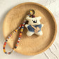Keypus cartoon doll keychain with detailed facial embroidery and sewn limbs