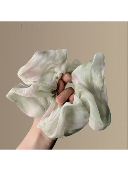Gifty Chic dip dye scrunchie displayed flat highlighting color gradient
