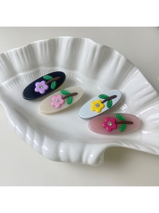 Beau fashionable oval shaped hair clip in glossy tortoiseshell pattern