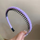 Gifty headband paired with casual and formal outfits on a mannequin