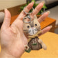 Vintage cat charm keychain packaged in a small gift box with clear lid