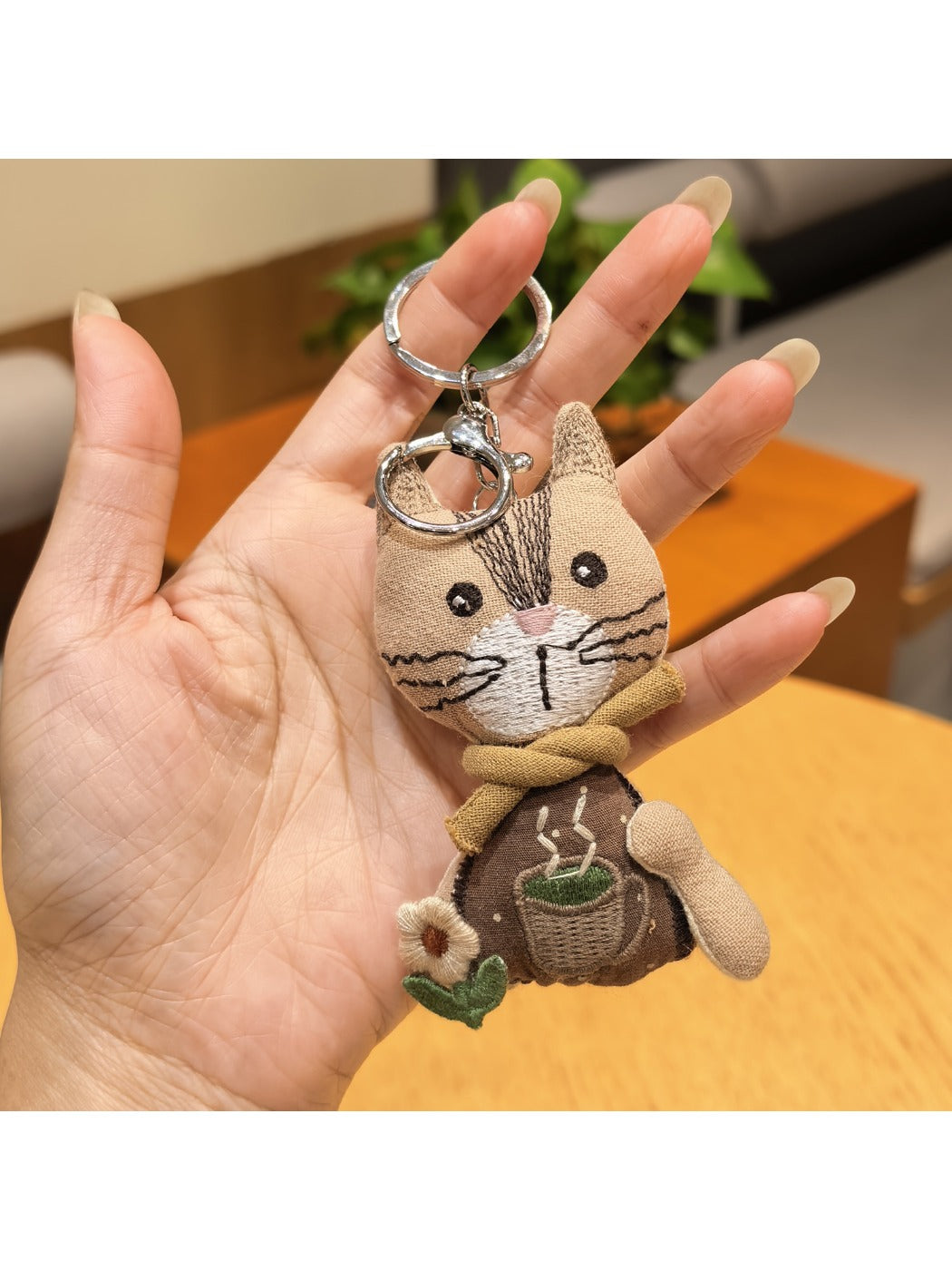 Vintage cat charm keychain packaged in a small gift box with clear lid