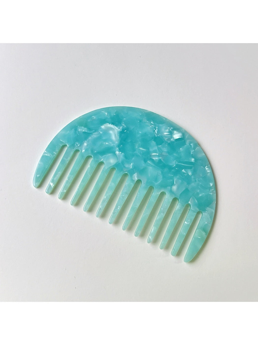 Top view of Camerow half round hair comb highlighting smooth edges