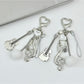 Keypus music style note keychain with black and white musical note design on metal ring