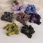 Close-up of scrunchie fabric texture showing soft, smooth material and floral design