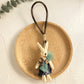 Top view of the bunny pendant keychain highlighting its smooth edges