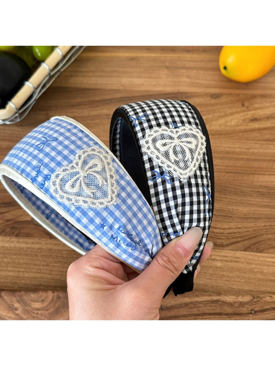 Gifty plaid bow print headband displayed on a white background