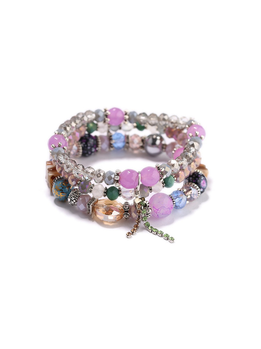 Lovra bracelet laid flat showing multiple rows of gold and pearl beads