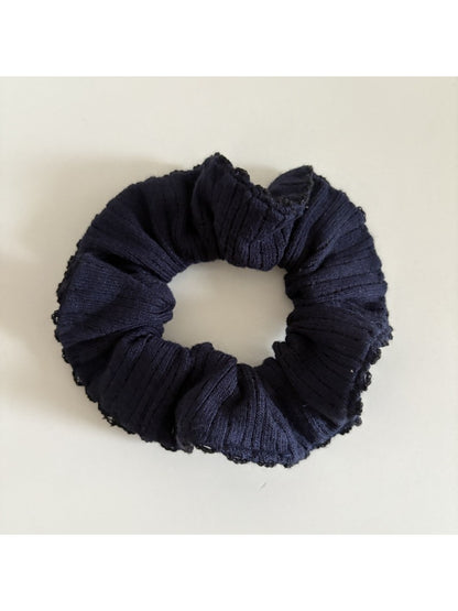 Gifty scrunchie packaged in branded box with clear view of product