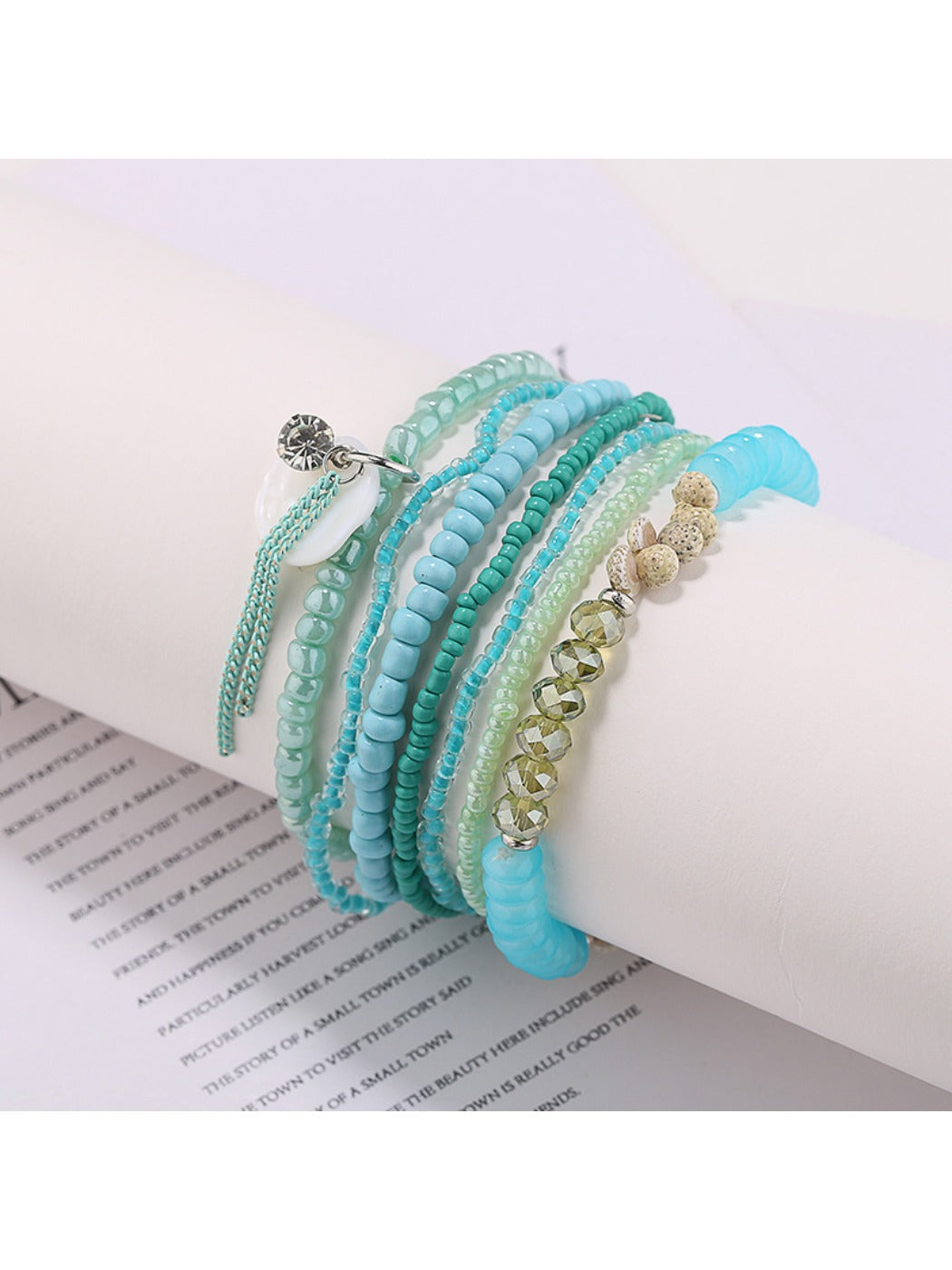 Detailed shot of Lovra bracelet clasp and bead arrangement in multiple colors