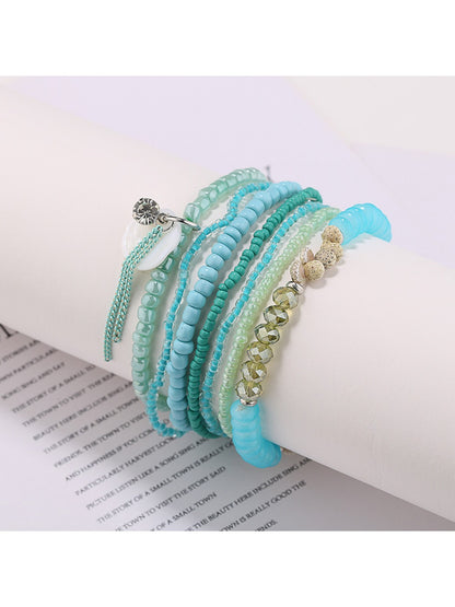 Detailed shot of Lovra bracelet clasp and bead arrangement in multiple colors