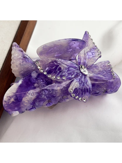 Beau colorful butterfly hair claw clip angled to show depth and texture