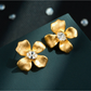 Earedge - Luxury Style Four Petal Flower Stud Earrings