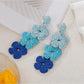 Close-up of earring clasp and color block design on Earedge Bohemian drop earrings