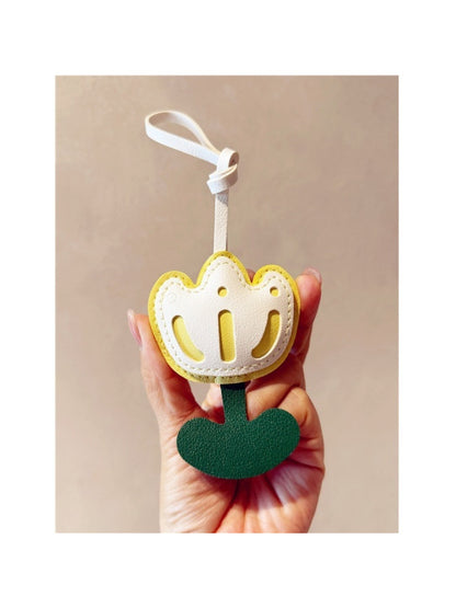 Tulip keychain with gold ring and clasp on a white background