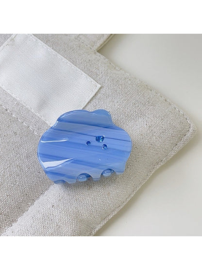 Beau cloud shaped hair claw clip displayed with soft natural lighting