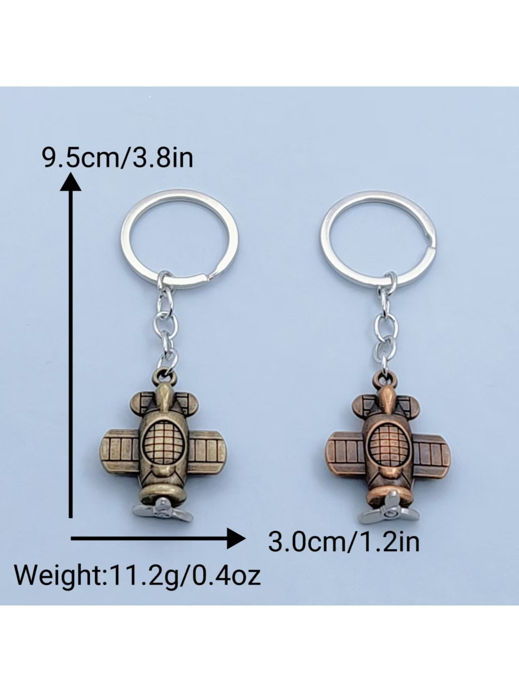 Side view of the airplane keychain showing realistic cockpit and engine details