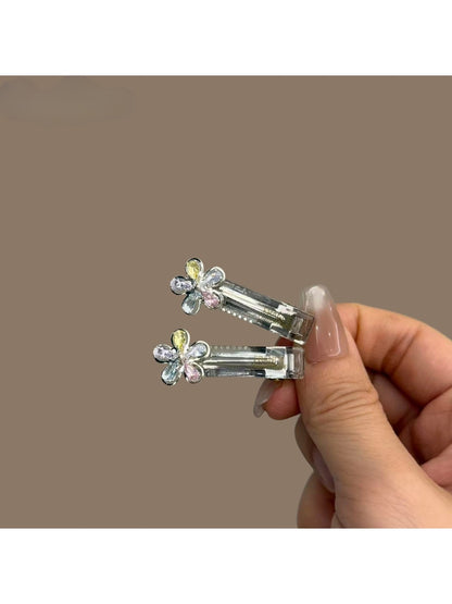 Close-up of a single vibrant hair clip with a sleek minimalist design