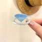 Beau ring shape claw clip styled in hair, securing a bun