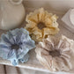 Gifty lace scrunchie displayed on a white background highlighting its relaxed, comfortable style
