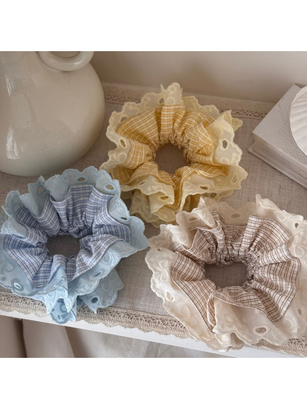 Gifty lace scrunchie displayed on a white background highlighting its relaxed, comfortable style