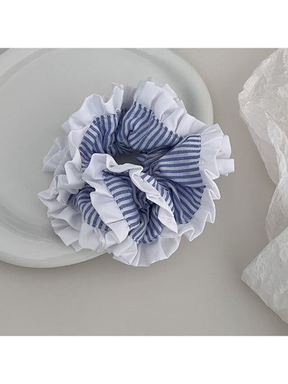 Gifty Sweet Stripe Ruffle Scrunchie displayed flat highlighting its ruffled edges and striped pattern