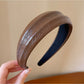 Gifty headband folded to show flexibility and fabric quality