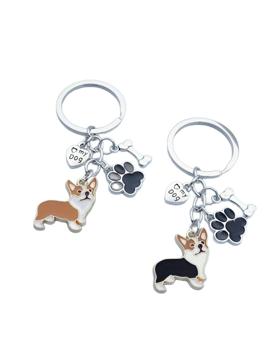 Puppy keychain hanging from a set of keys against a white background