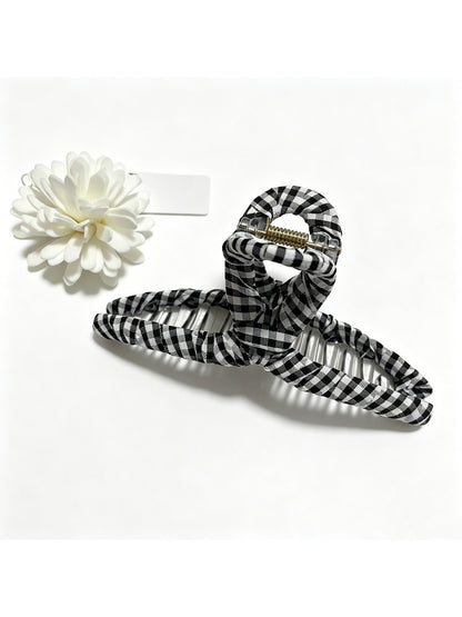 Beau colorful plaid fabric wrapped claw clip styled in hair
